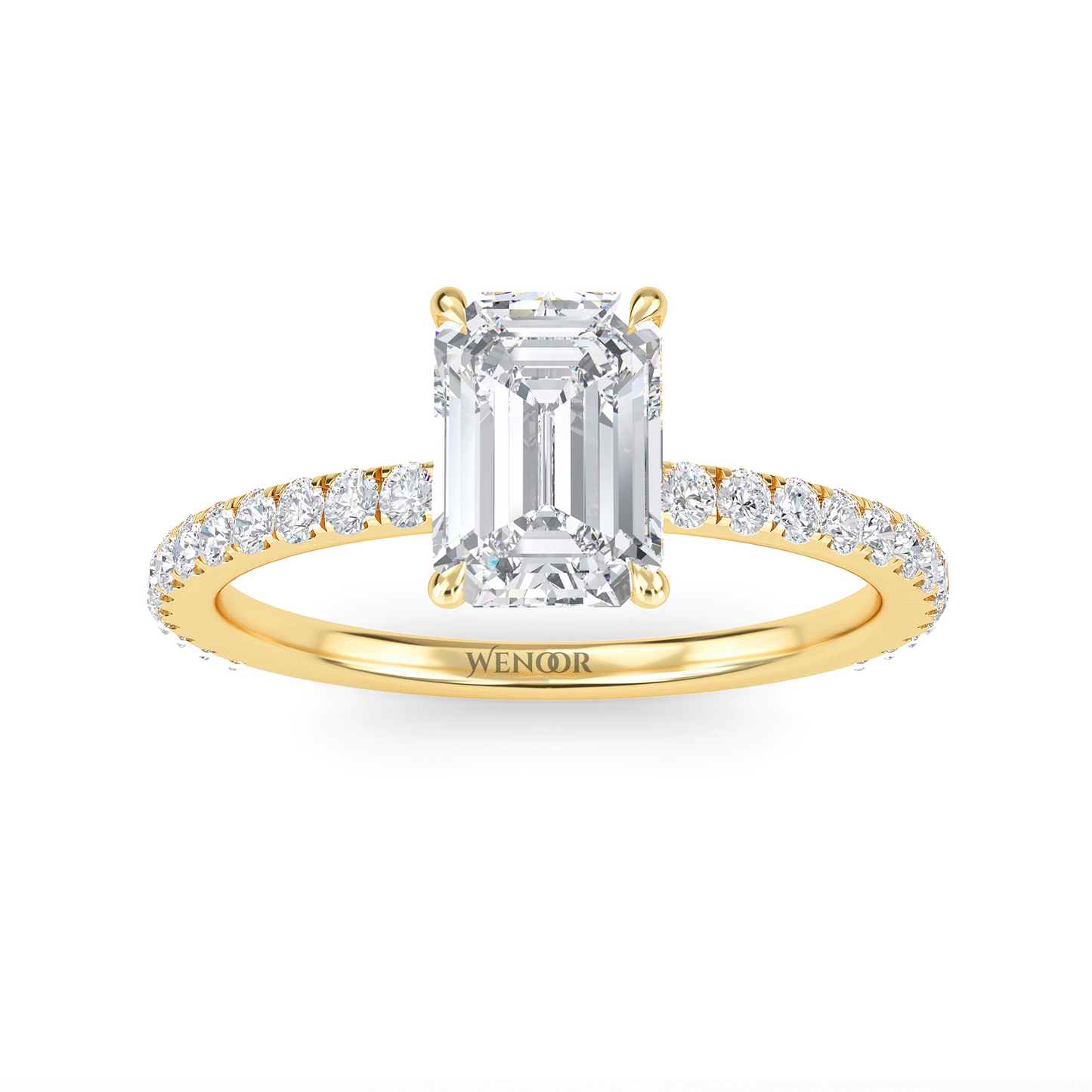 Bride's hand wearing emerald cut lab diamond engagement ring