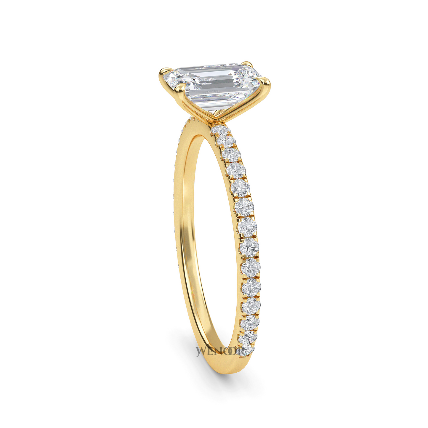 Bride's hand wearing emerald cut lab diamond engagement ring