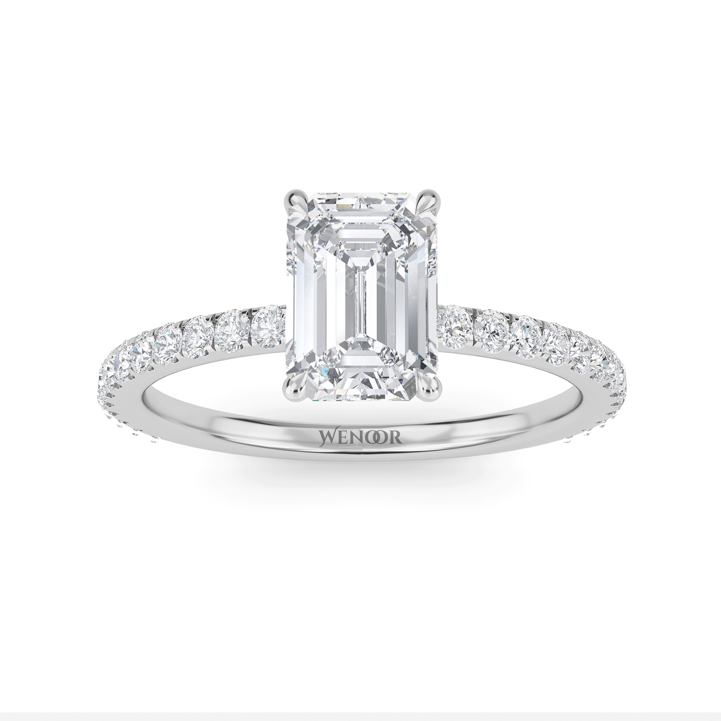 Bride's hand wearing emerald cut lab diamond engagement ring
