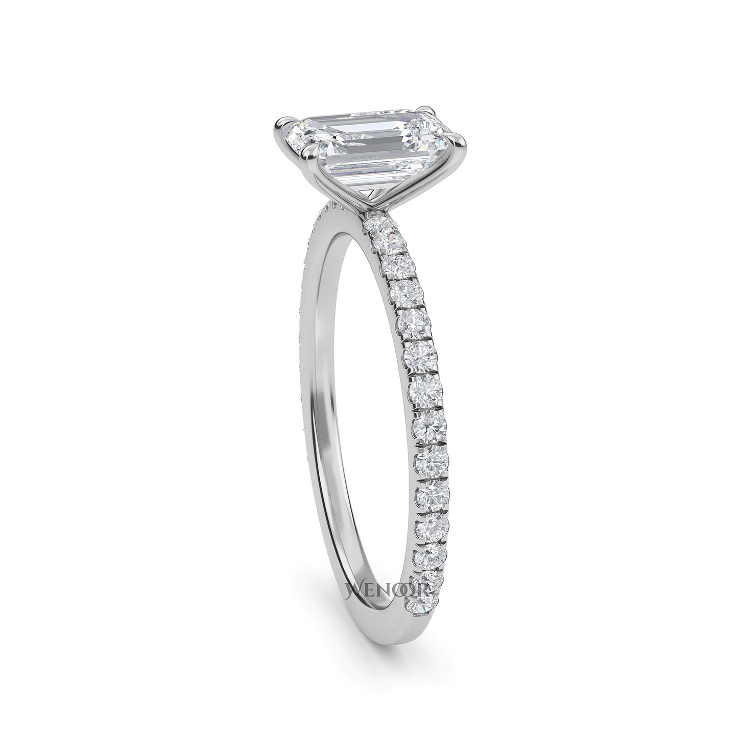 Bride's hand wearing emerald cut lab diamond engagement ring