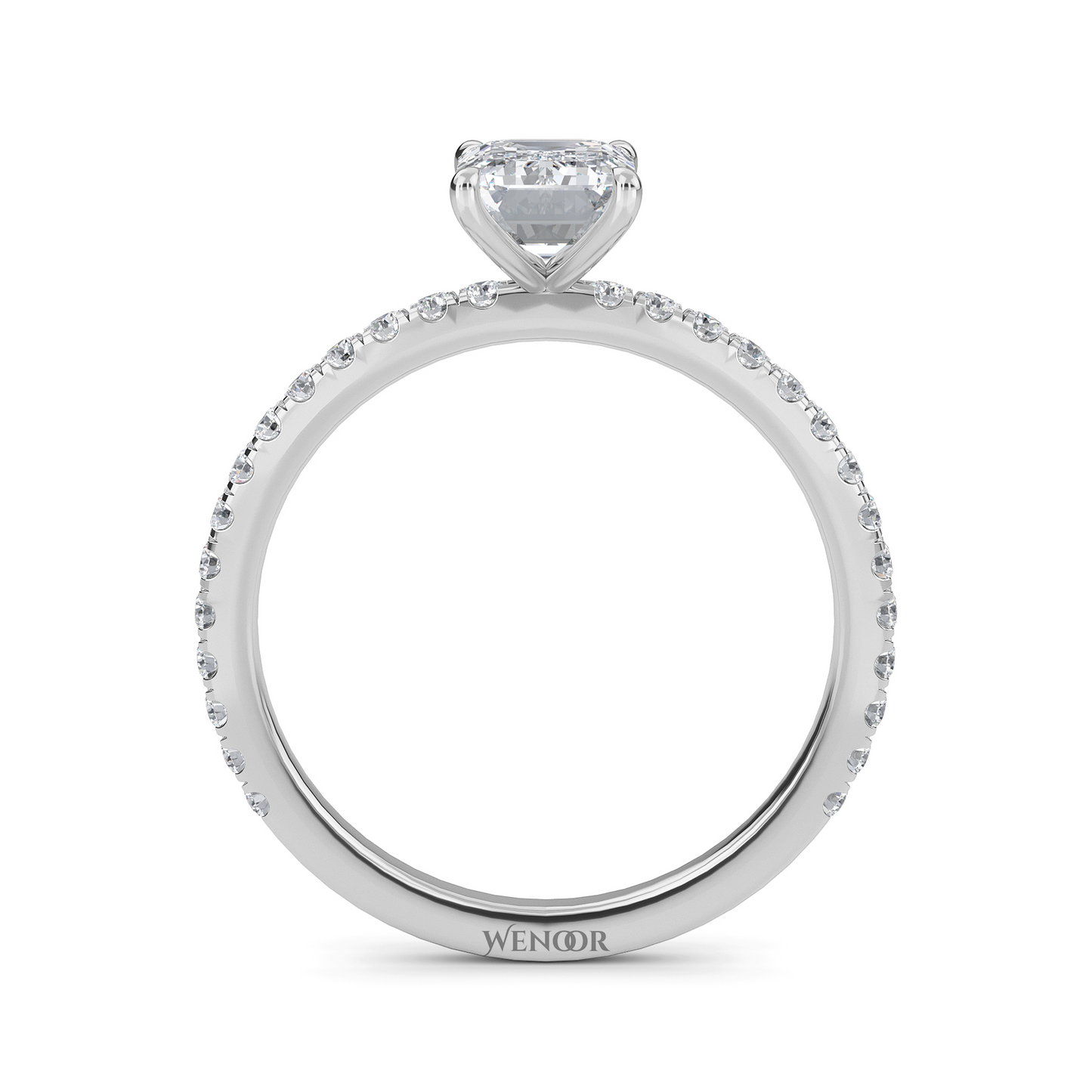 Bride's hand wearing emerald cut lab diamond engagement ring