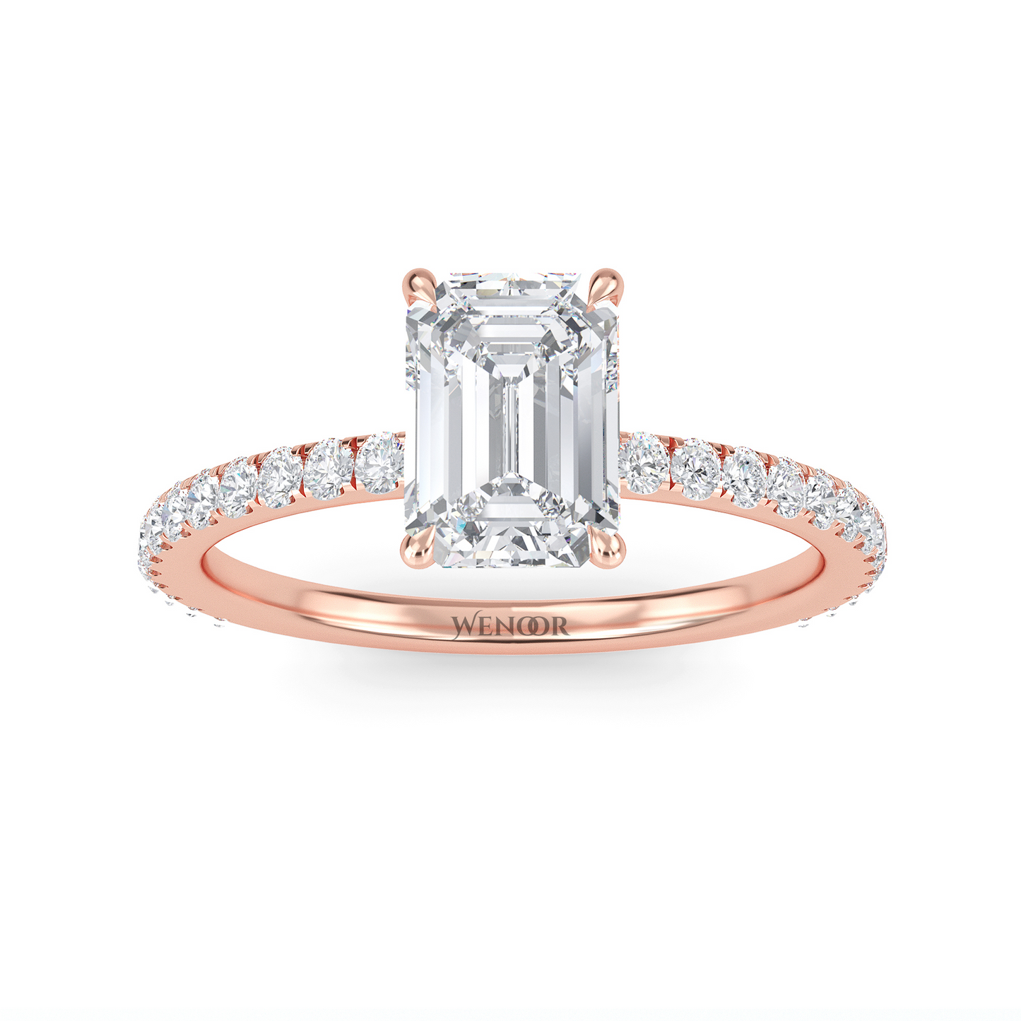 Bride's hand wearing emerald cut lab diamond engagement ring