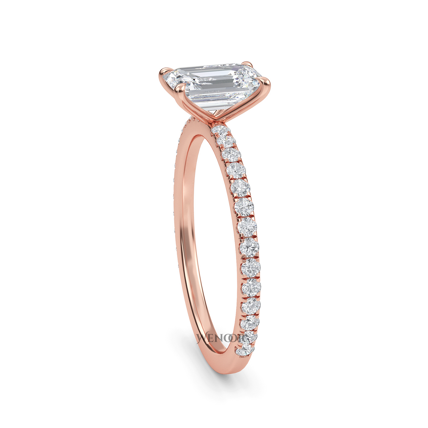 Bride's hand wearing emerald cut lab diamond engagement ring