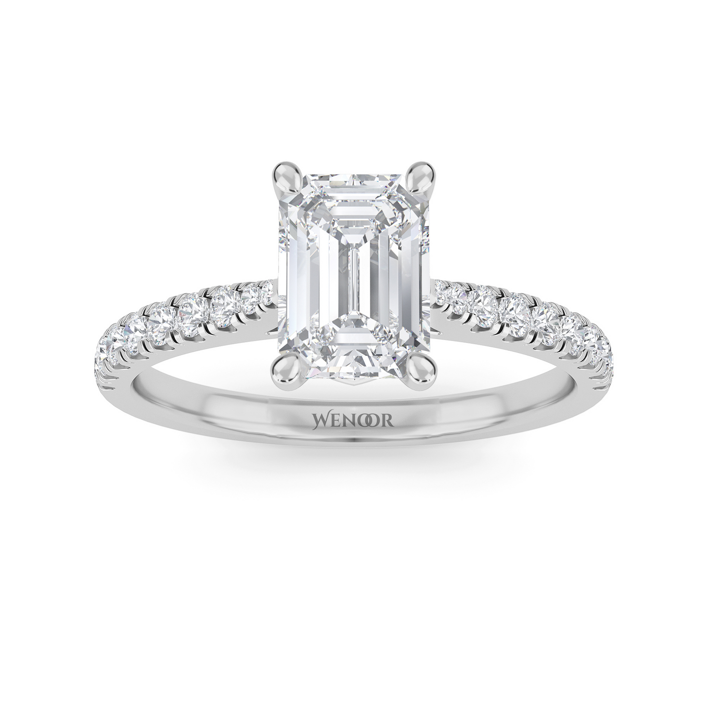 Amerald cut lab grown diamond ring with a gold band and accent side stones, featuring a brilliant step cut center stone