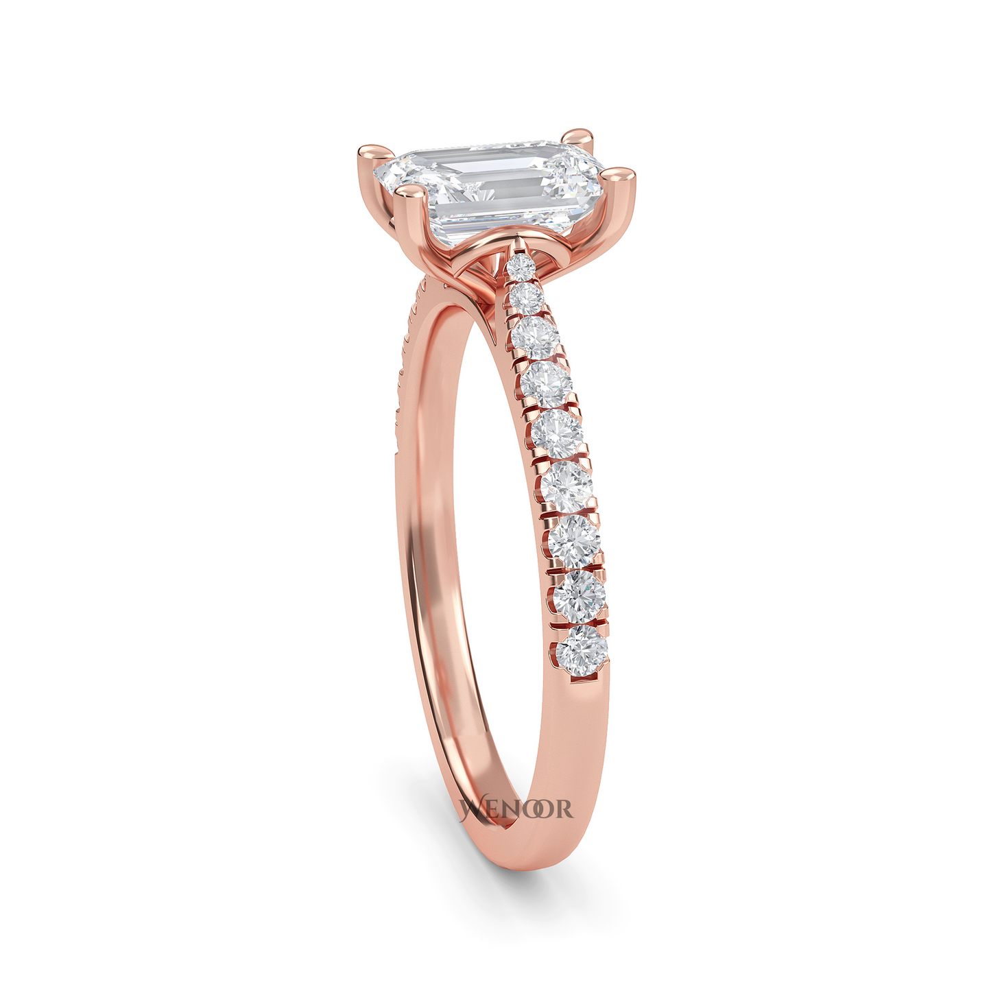 Amerald cut lab grown diamond ring with a gold band and accent side stones, featuring a brilliant step cut center stone