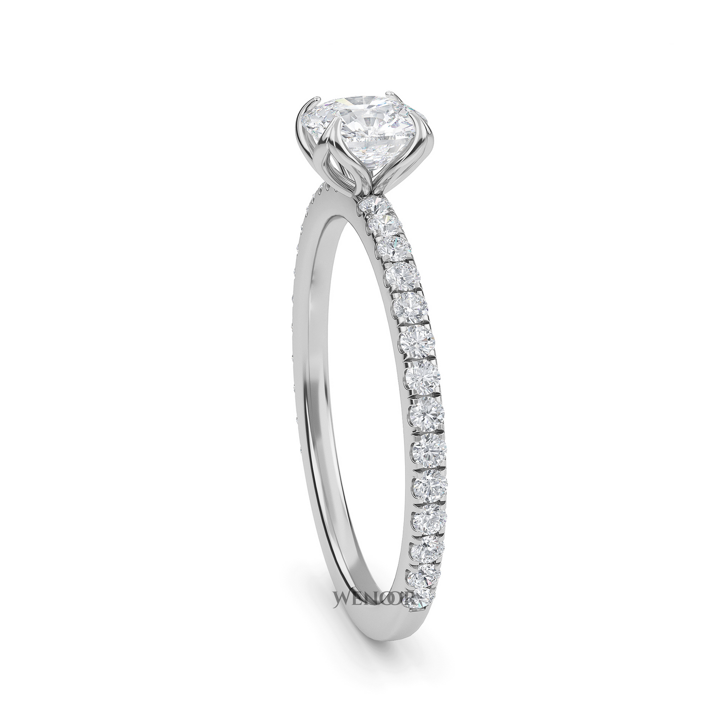 Bride showing cushion cut lab diamond wedding ring on hand