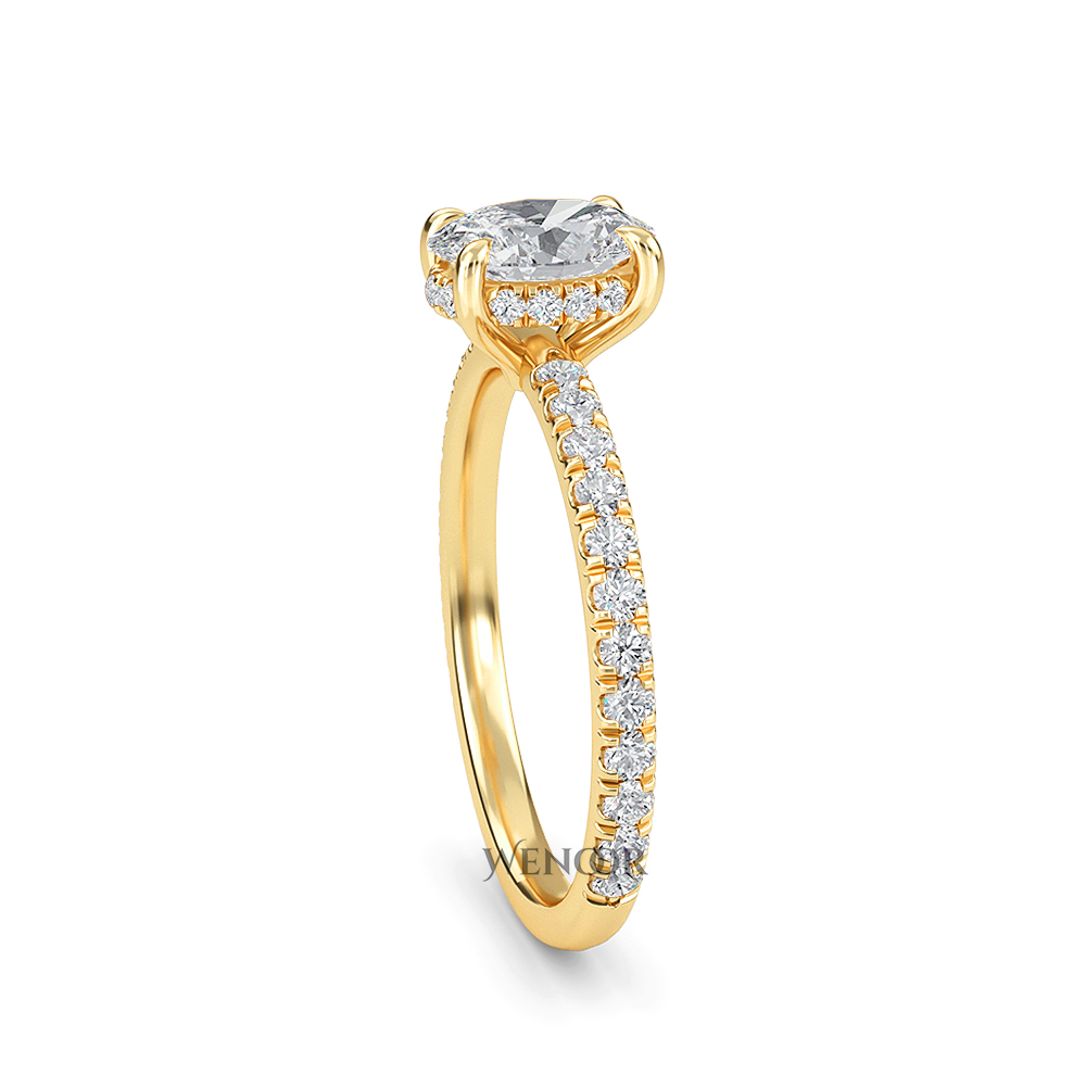 Elegant oval cut lab diamond engagement ring with a hidden halo setting, featuring sparkling accent stones.