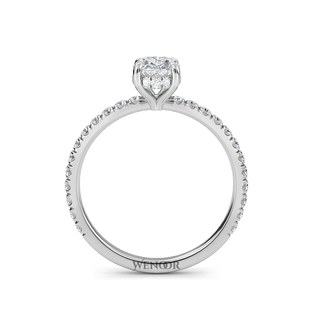 Elegant oval cut lab diamond engagement ring with a hidden halo setting, featuring sparkling accent stones.