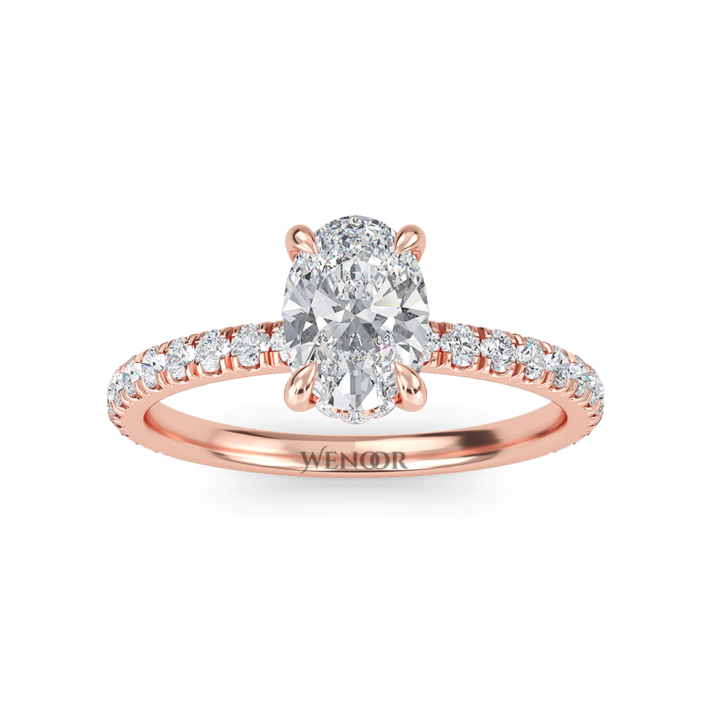 Elegant oval cut lab diamond engagement ring with a hidden halo setting, featuring sparkling accent stones.
