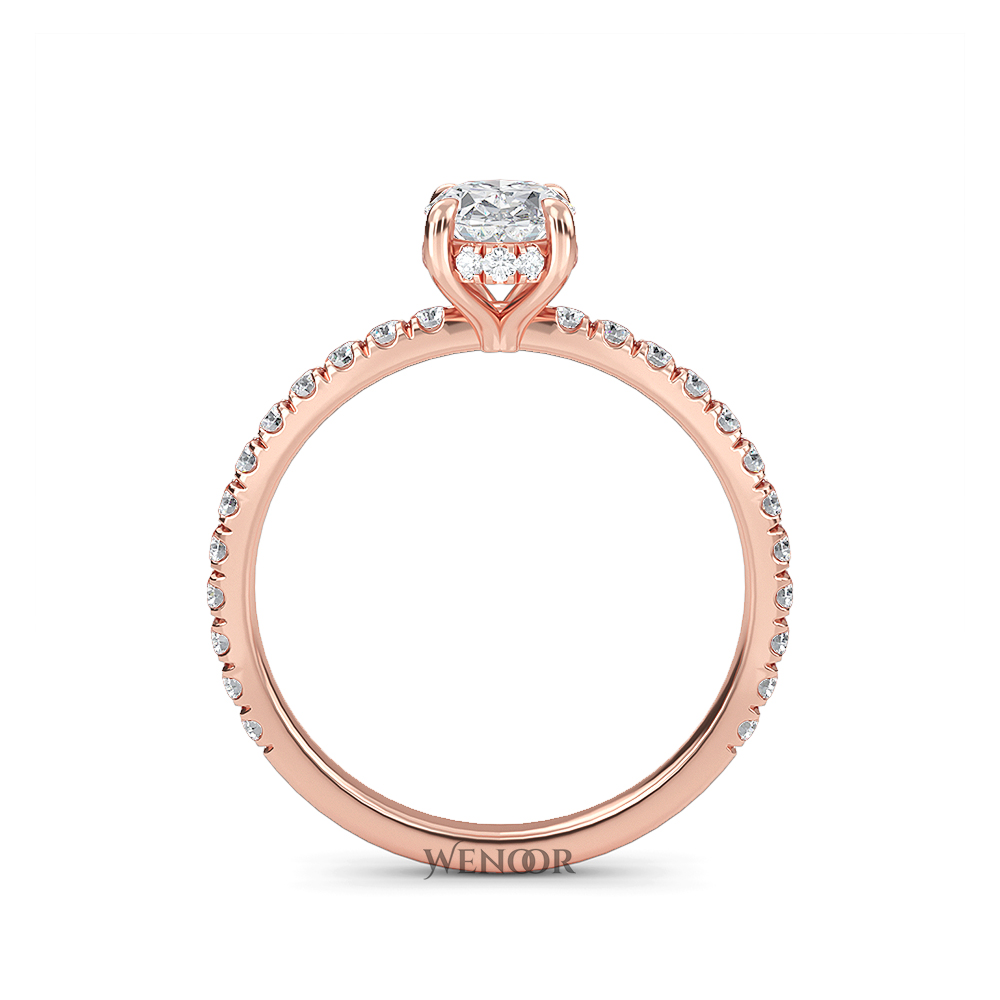 Elegant oval cut lab diamond engagement ring with a hidden halo setting, featuring sparkling accent stones.