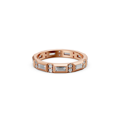 Luxurious bezel set eternity band featuring sparkling round diamonds and geometric baguette cut lab diamonds in rich 14K gold