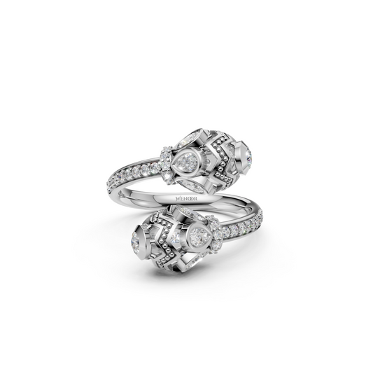 Dainty 14K gold wedding Ring with round and pear cut lab diamonds for a love story as timeless as its vintage design.