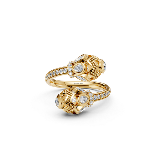 Dainty 14K gold wedding Ring with round and pear cut lab diamonds for a love story as timeless as its vintage design.
