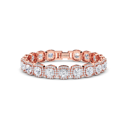 Rose gold tennis bracelet featuring cushion  and round lab diamonds - luxurious bridal gift.