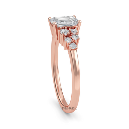 Unique east west emerald cut diamond ring with a geometric white yellow rose gold band for emerald cut diamond accent style ring