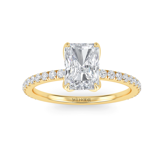 Radiant cut side stone engagement ring