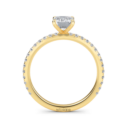 Bride's hand wearing emerald cut lab diamond engagement ring