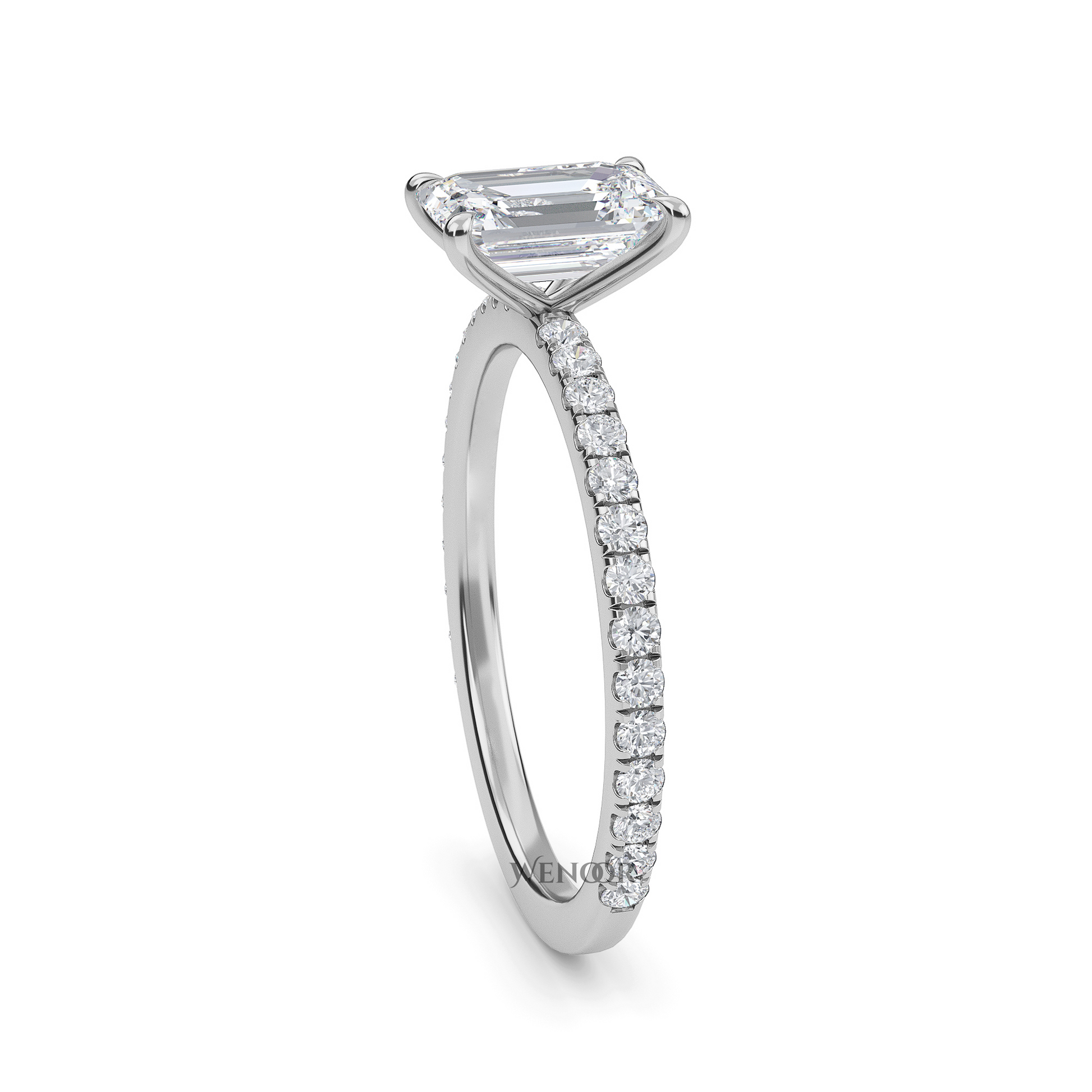 Bride's hand wearing emerald cut lab diamond engagement ring