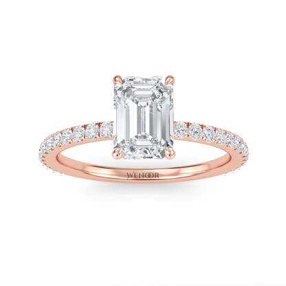 Bride's hand wearing emerald cut lab diamond engagement ring