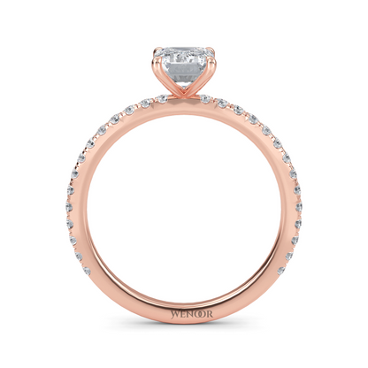 Bride's hand wearing emerald cut lab diamond engagement ring