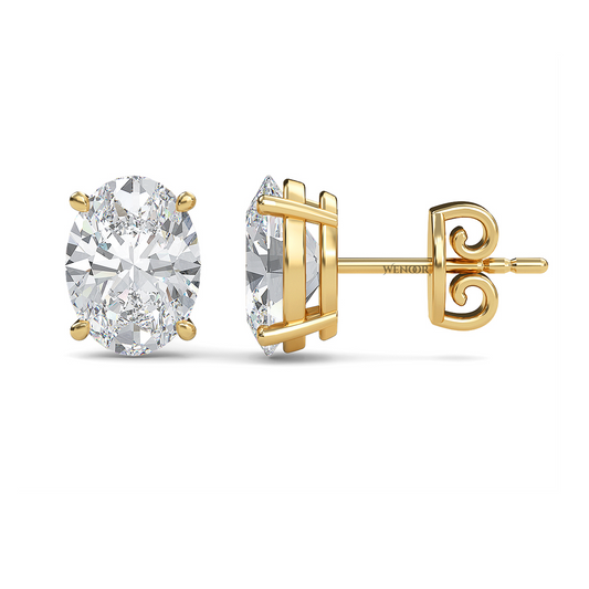 Oval lab diamond stud earrings in gold  ethical luxury for daily wear.
