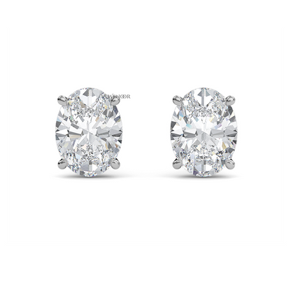 Oval lab diamond stud earrings in gold  ethical luxury for daily wear.