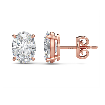 Oval lab diamond stud earrings in gold  ethical luxury for daily wear.