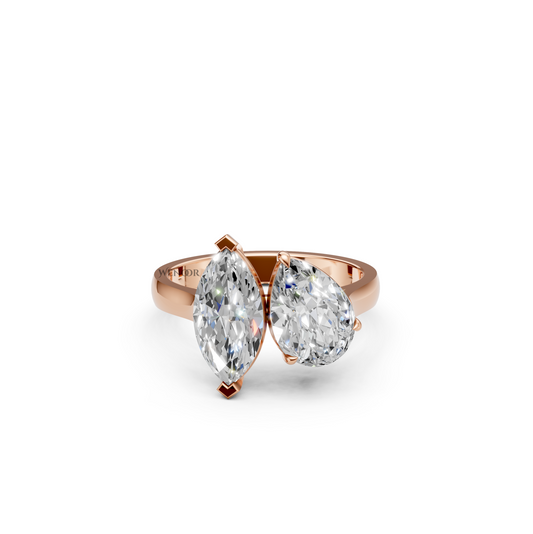 Symbolic Toi et Moi engagement ring with marquise and pear lab diamonds
