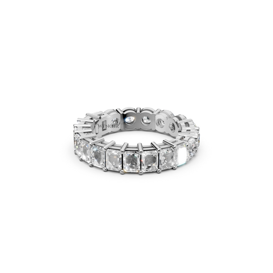 Sustainable lab grown diamond engagement ring with a radiant cut center and round brilliant side stones.