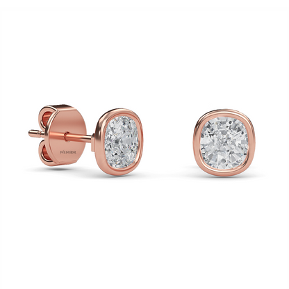 Exquisite cushion cut lab grown diamond stud earrings set in a secure 14K gold bezel setting
