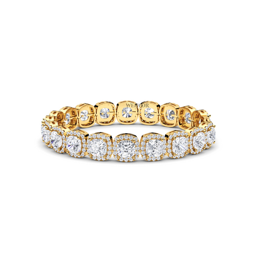 Yellow gold tennis bracelet featuring cushion  and round lab diamonds - luxurious bridal gift.
