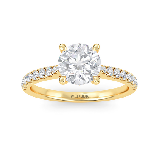 Woman wearing round brilliant lab grown diamond wedding ring
