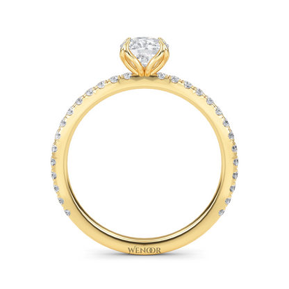 Bride showing cushion cut lab diamond wedding ring on hand