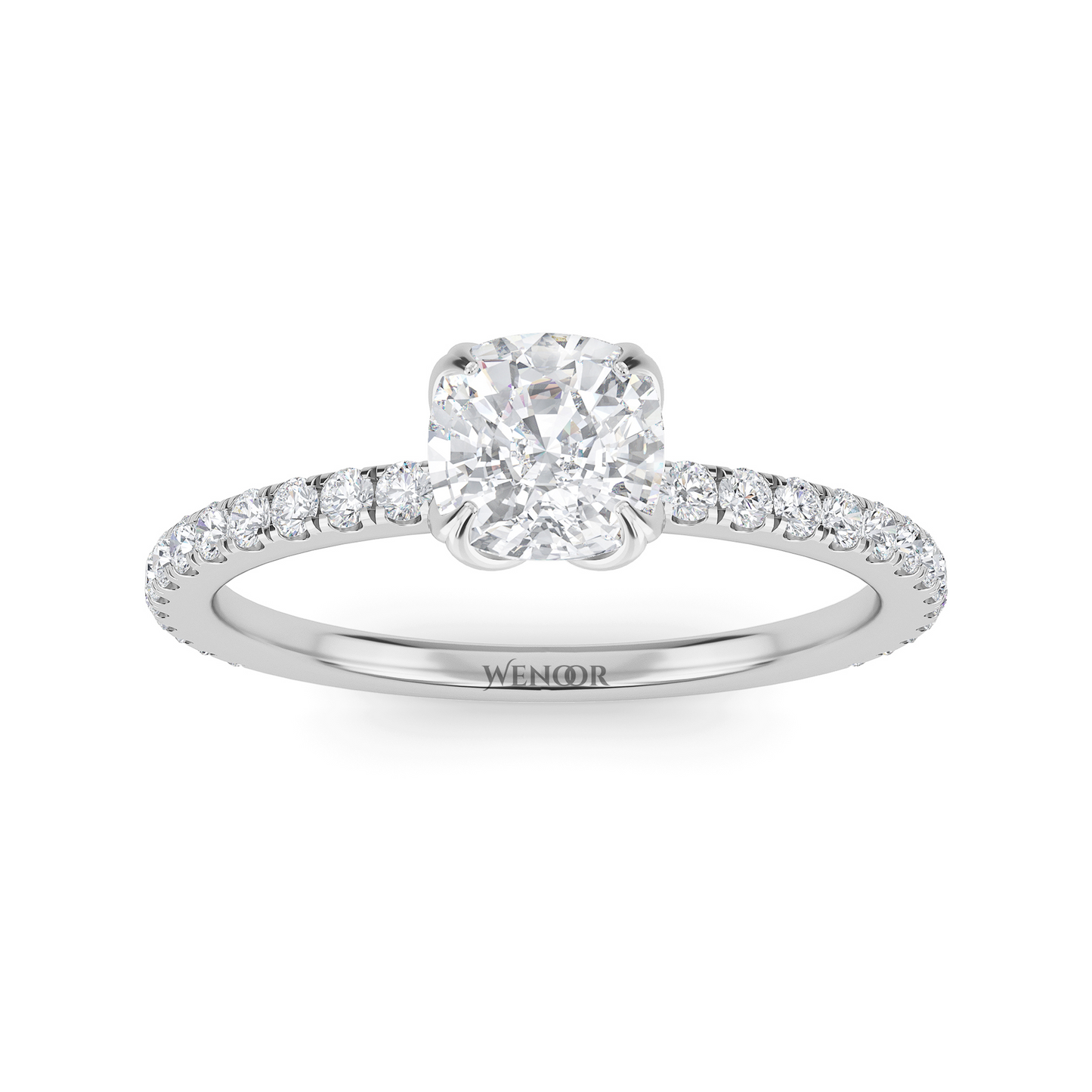 Bride showing cushion cut lab diamond wedding ring on hand