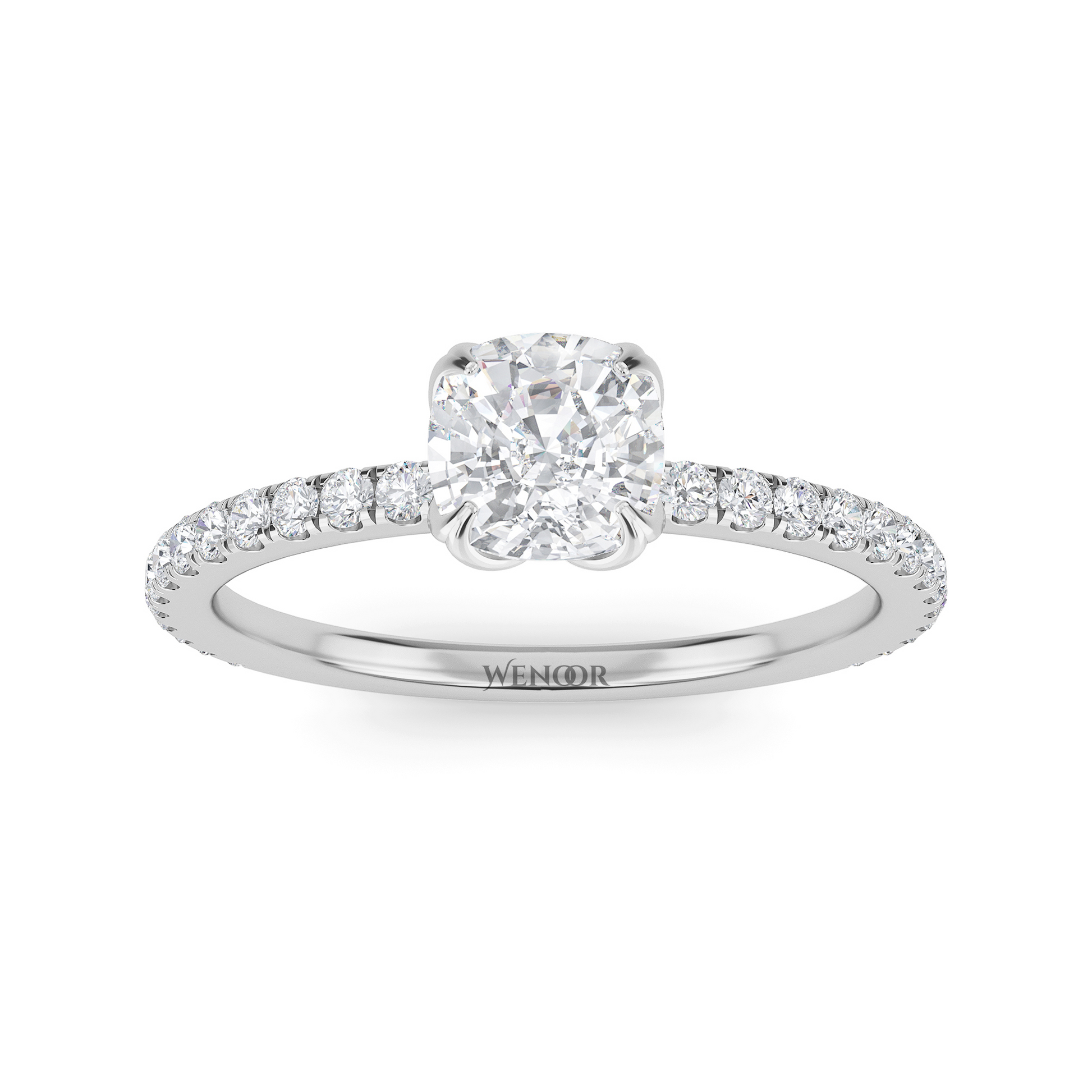 Bride showing cushion cut lab diamond wedding ring on hand