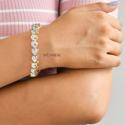 Elegant heart shaped diamond tennis bracelet in rose gold - perfect anniversary gift with ethical lab grown stones