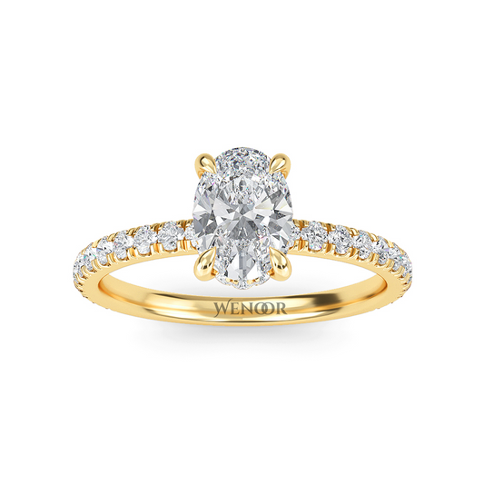 Elegant oval cut lab diamond engagement ring with a hidden halo setting, featuring sparkling accent stones.