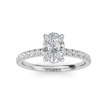 Elegant oval cut lab diamond engagement ring with a hidden halo setting, featuring sparkling accent stones.