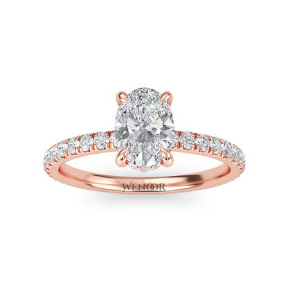 Elegant oval cut lab diamond engagement ring with a hidden halo setting, featuring sparkling accent stones.