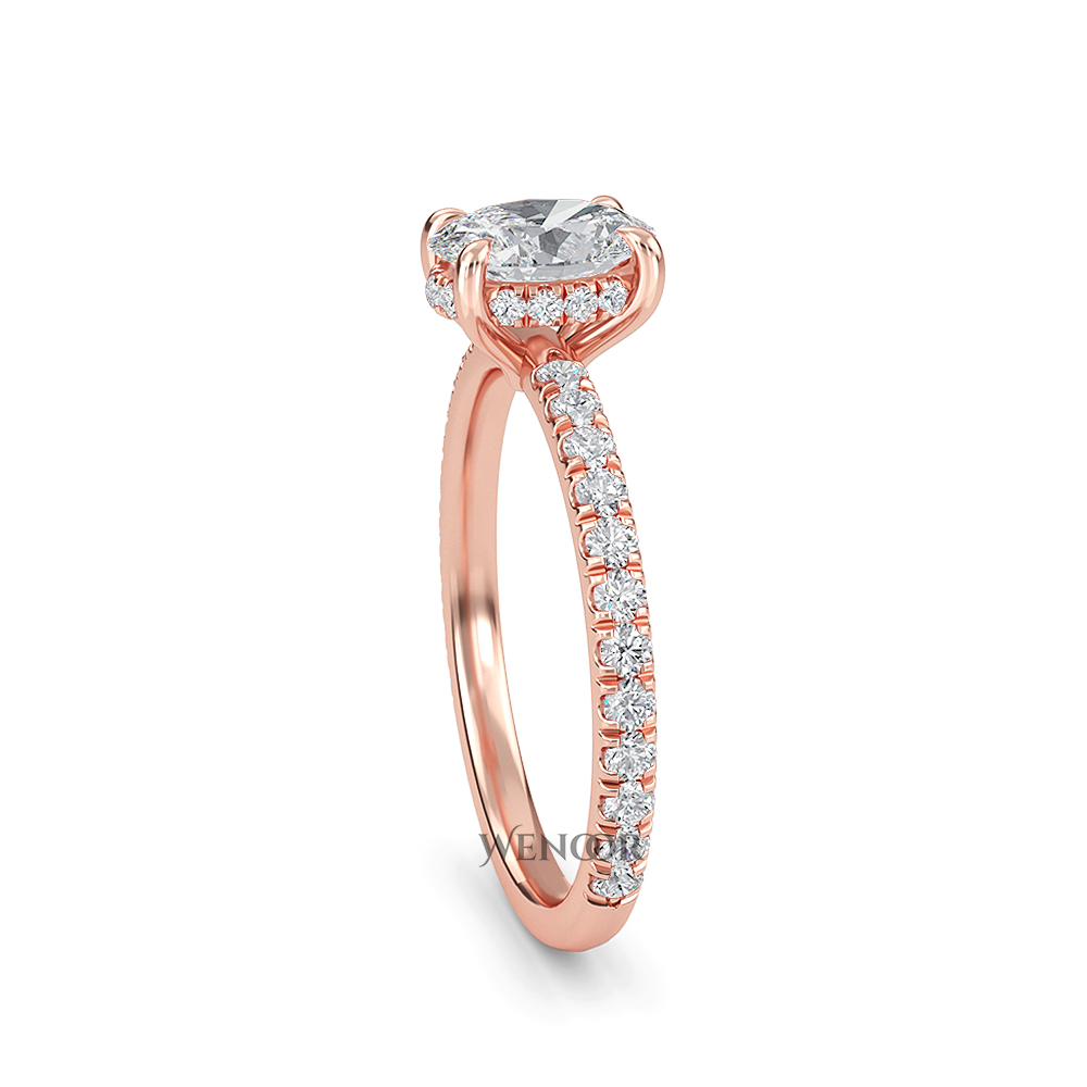 Elegant oval cut lab diamond engagement ring with a hidden halo setting, featuring sparkling accent stones.