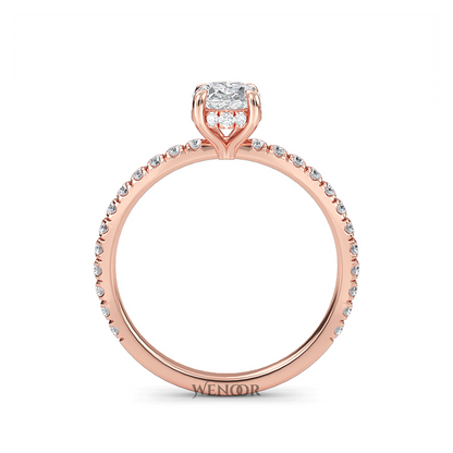 Elegant oval cut lab diamond engagement ring with a hidden halo setting, featuring sparkling accent stones.