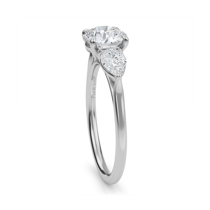 Luxury three stone engagement ring in 14K gold with 1ct round lab diamond center and accent stones  conflict free fine jewelry