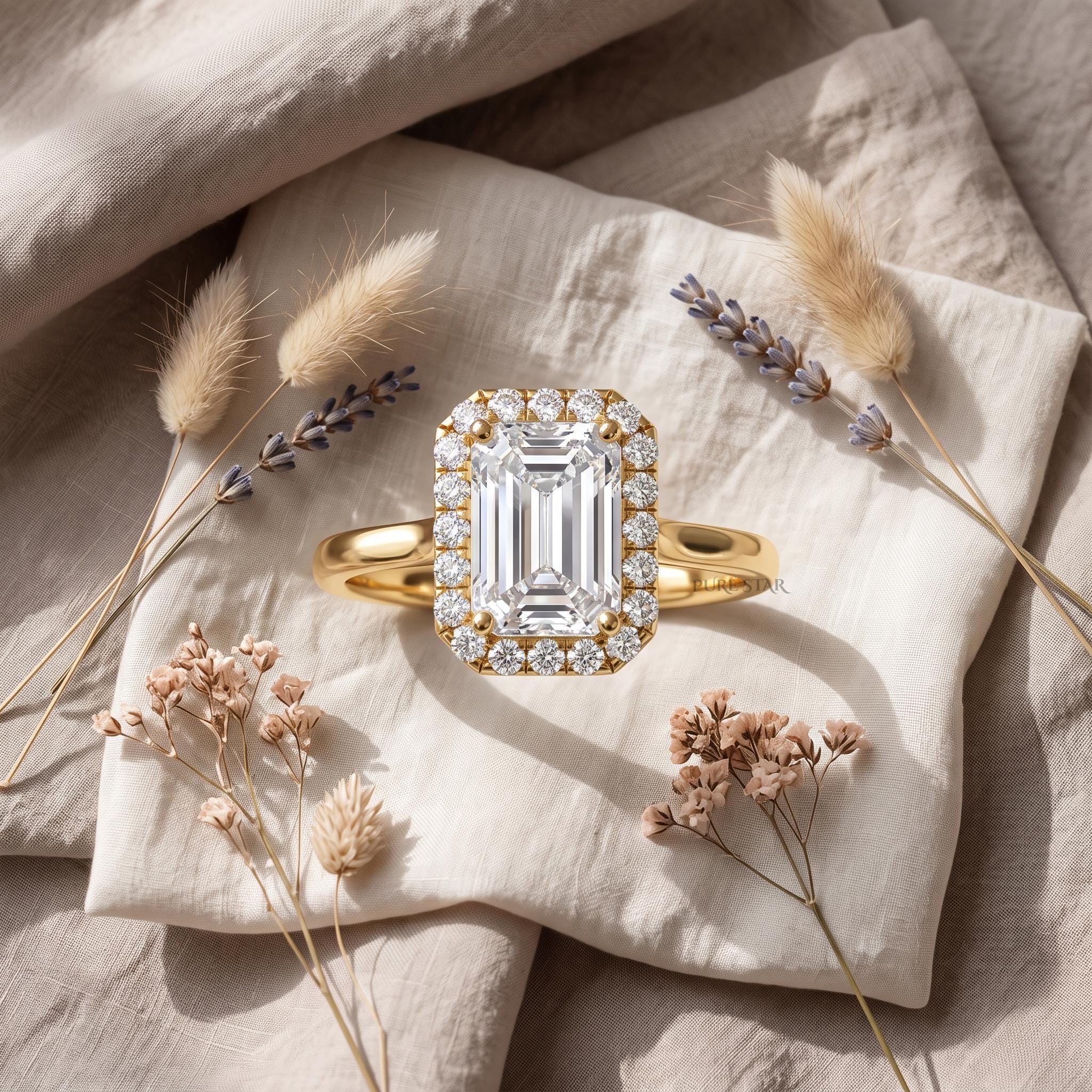 Luxury emerald cut diamond halo wedding ring worn on a woman's hand in natural light.
