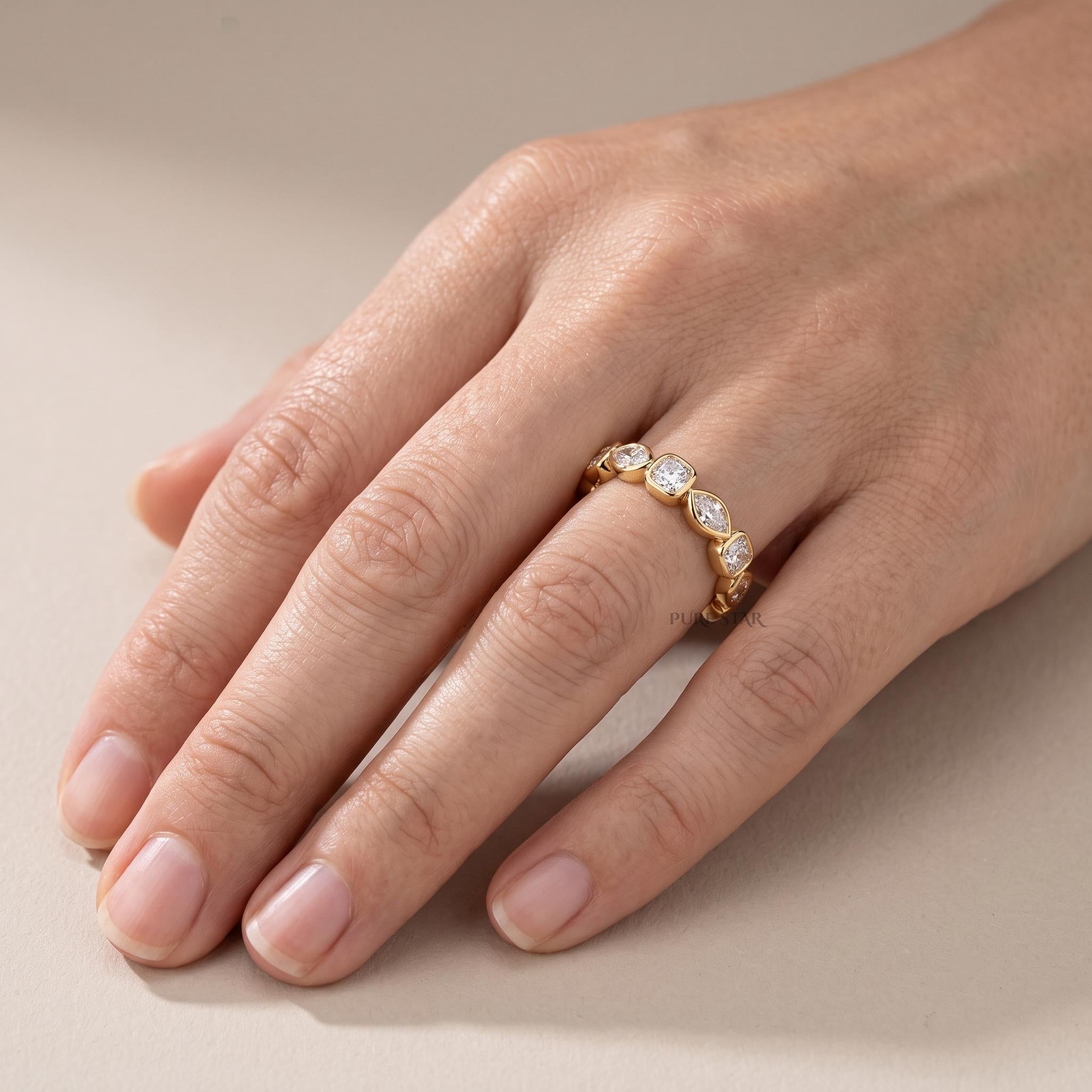 Luxury handcrafted marquise and cushion cut diamond wedding band displayed in a jewelry gift box.