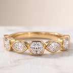 Stackable lab grown diamond half eternity ring featuring alternating marquise and cushion cuts.