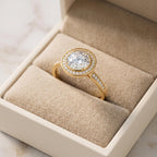 Luxury lab grown diamond engagement ring featuring a round brilliant center stone and polished gold band.