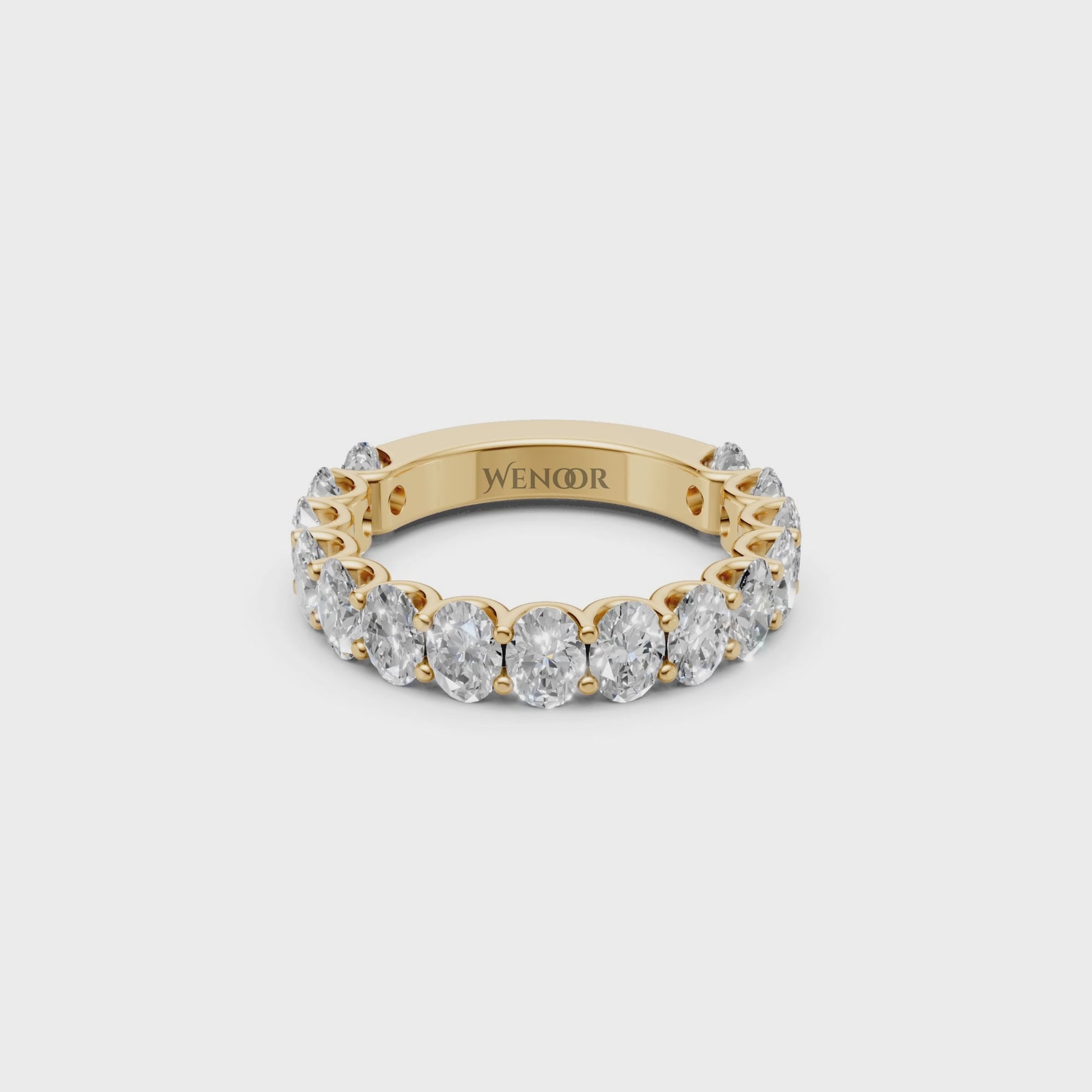 oval engagement ring with half eternity wedding band​ in 14k gold