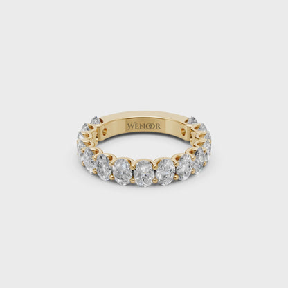 oval engagement ring with half eternity wedding band​ in 14k gold
