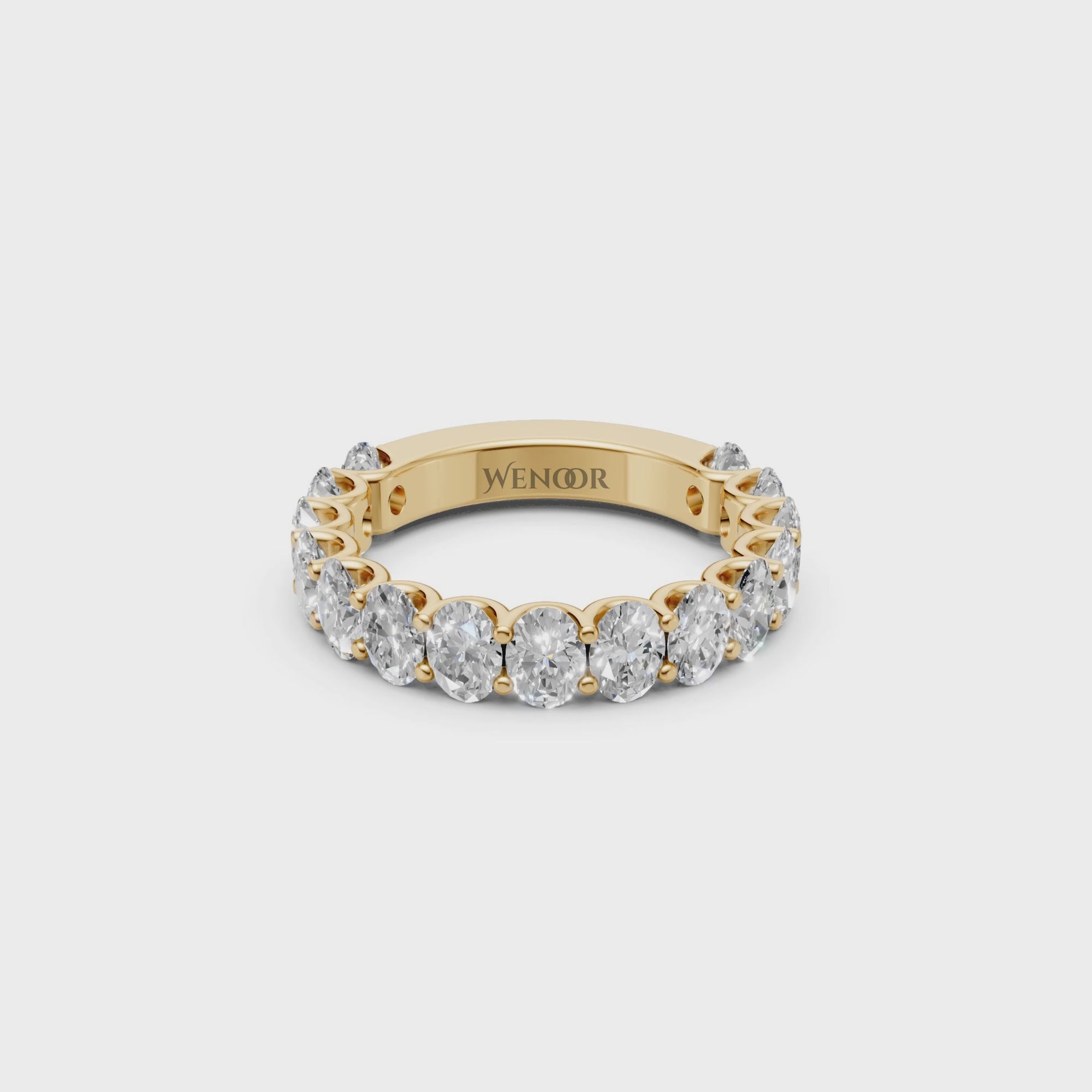 oval engagement ring with half eternity wedding band​ in 14k gold