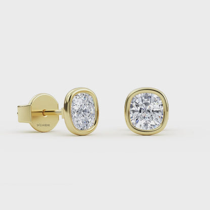 Exquisite cushion cut lab grown diamond stud earrings set in a secure 14K gold bezel setting